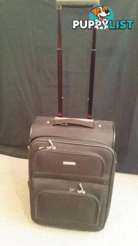 Assorted Suit Cases - Carry on Luggage