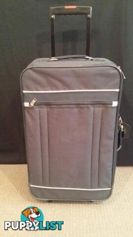 Assorted Suit Cases - Carry on Luggage