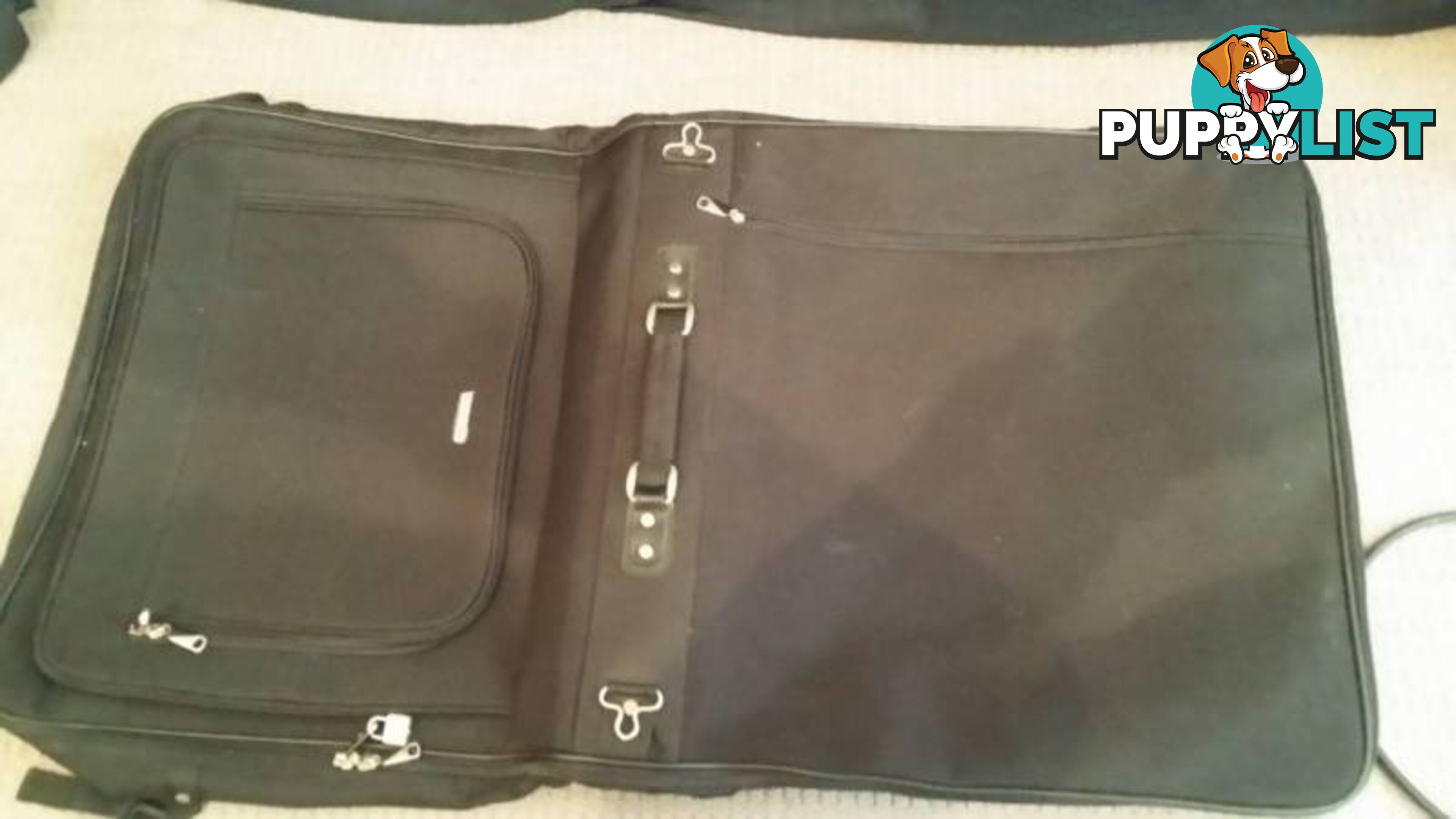 Assorted Suit Cases - Carry on Luggage