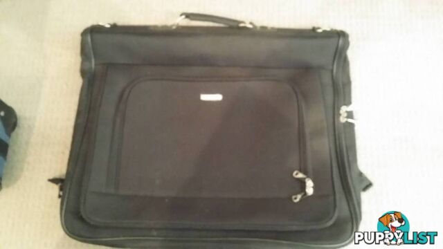 Assorted Suit Cases - Carry on Luggage