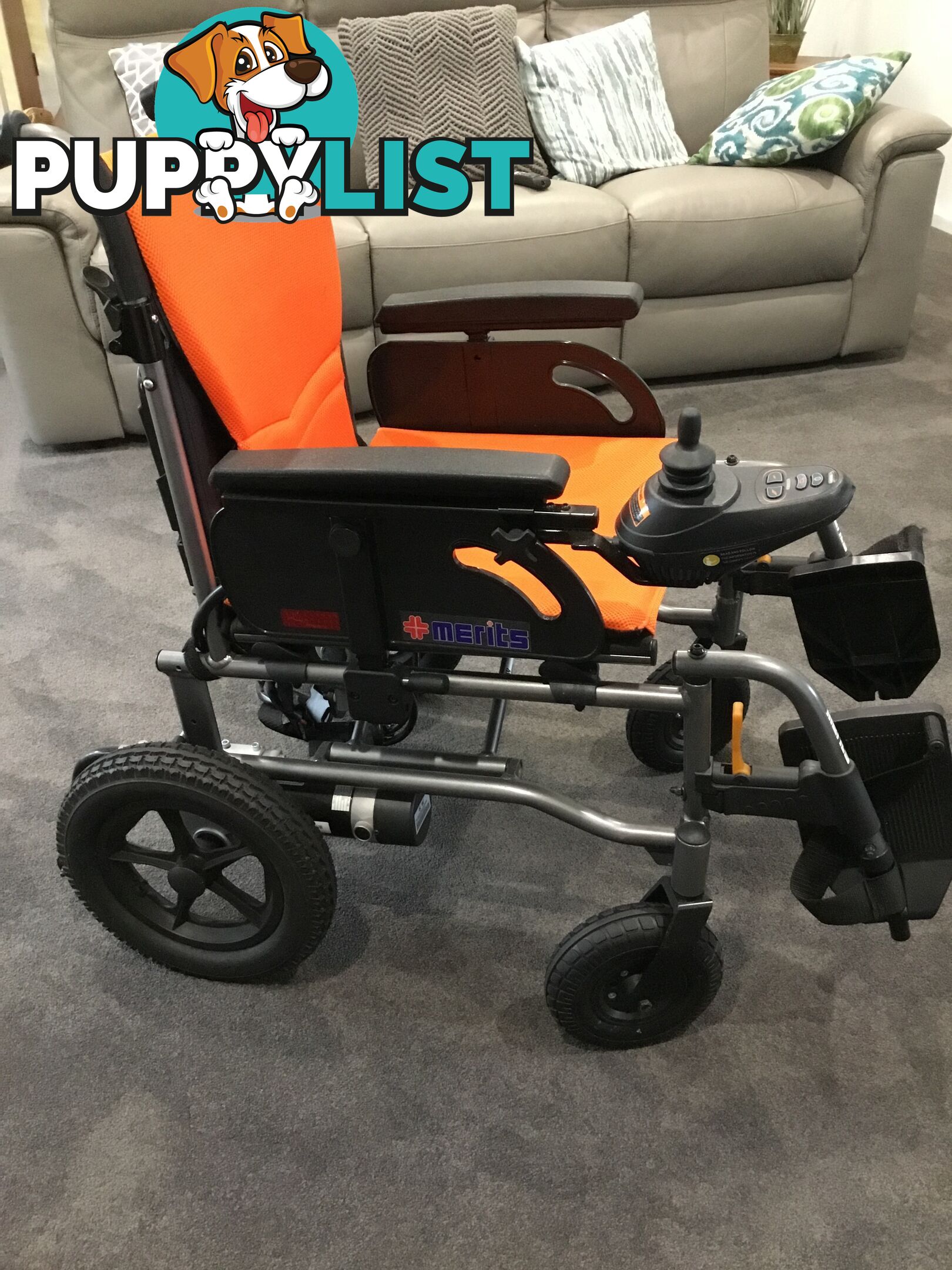 Merits Classic E-Power Wheelchair. As new. Will deliver. Reduced to sell