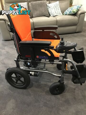 Merits Classic E-Power Wheelchair. As new. Will deliver. Reduced to sell