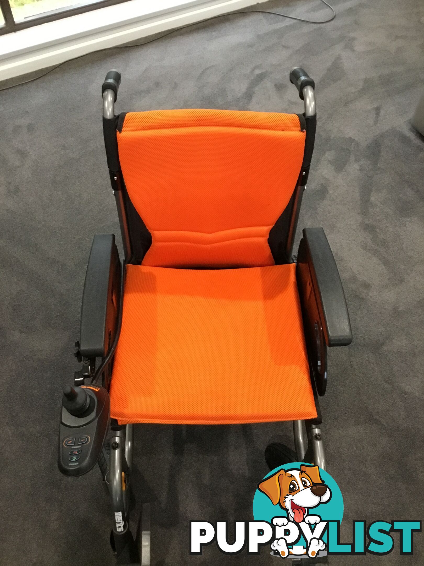 Merits Classic E-Power Wheelchair. As new. Will deliver. Reduced to sell