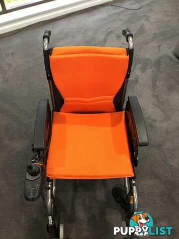 Merits Classic E-Power Wheelchair. As new. Will deliver. Reduced to sell