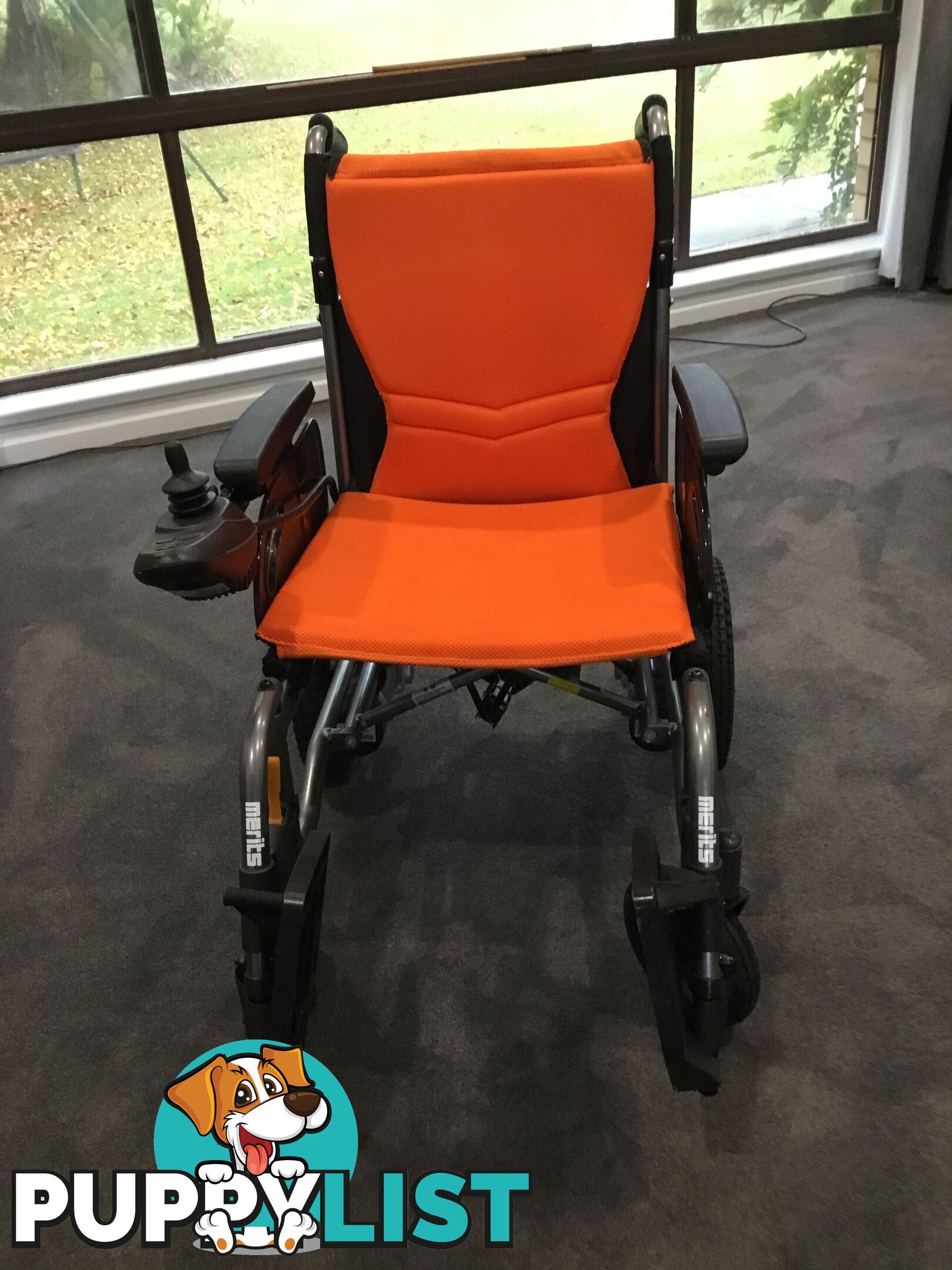 Merits Classic E-Power Wheelchair. As new. Will deliver. Reduced to sell