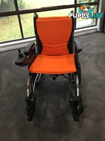 Merits Classic E-Power Wheelchair. As new. Will deliver. Reduced to sell