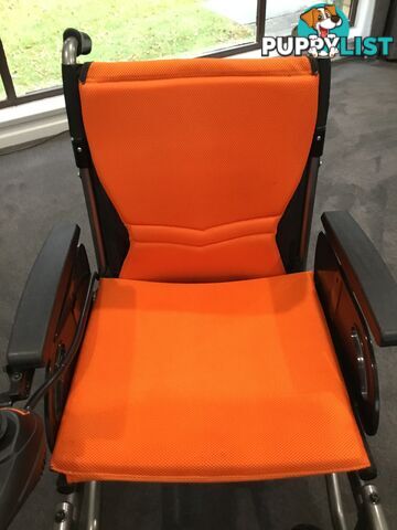 Merits Classic E-Power Wheelchair. As new. Will deliver. Reduced to sell