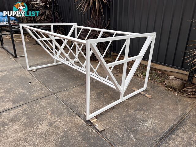 Cattle hay feeders