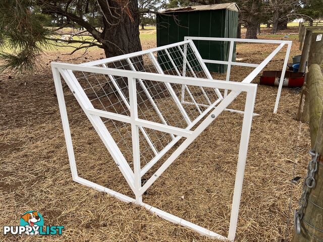 Cattle hay feeders
