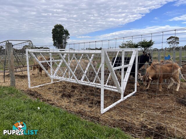 Cattle hay feeders