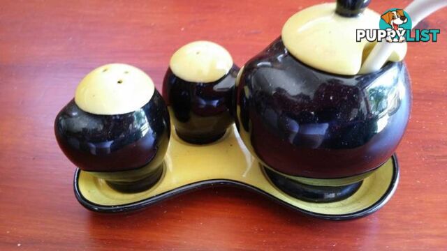 salt and pepper shakers with mustard pot