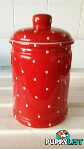 red and white poka dot cannister