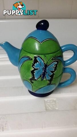 teapot with cup