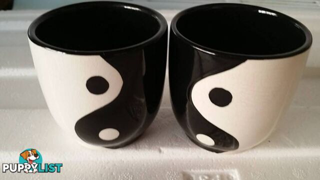 2 ying and yang candle holders