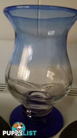 glass vase with blue base and top