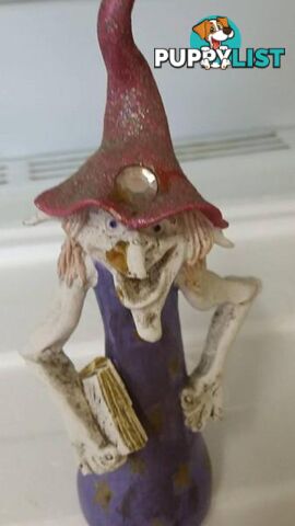 crazy old wizard figurine