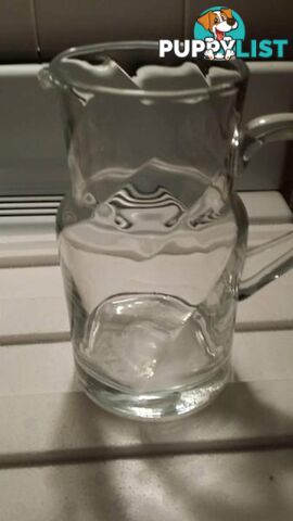 glass jug with unusual pattern