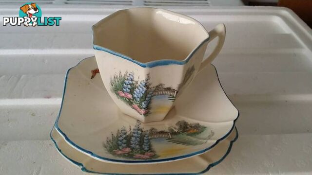 tea cup with saucer and plate