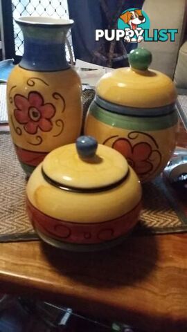 2 decorative cannisters and vase