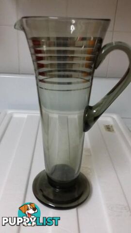 tall grey glass jug