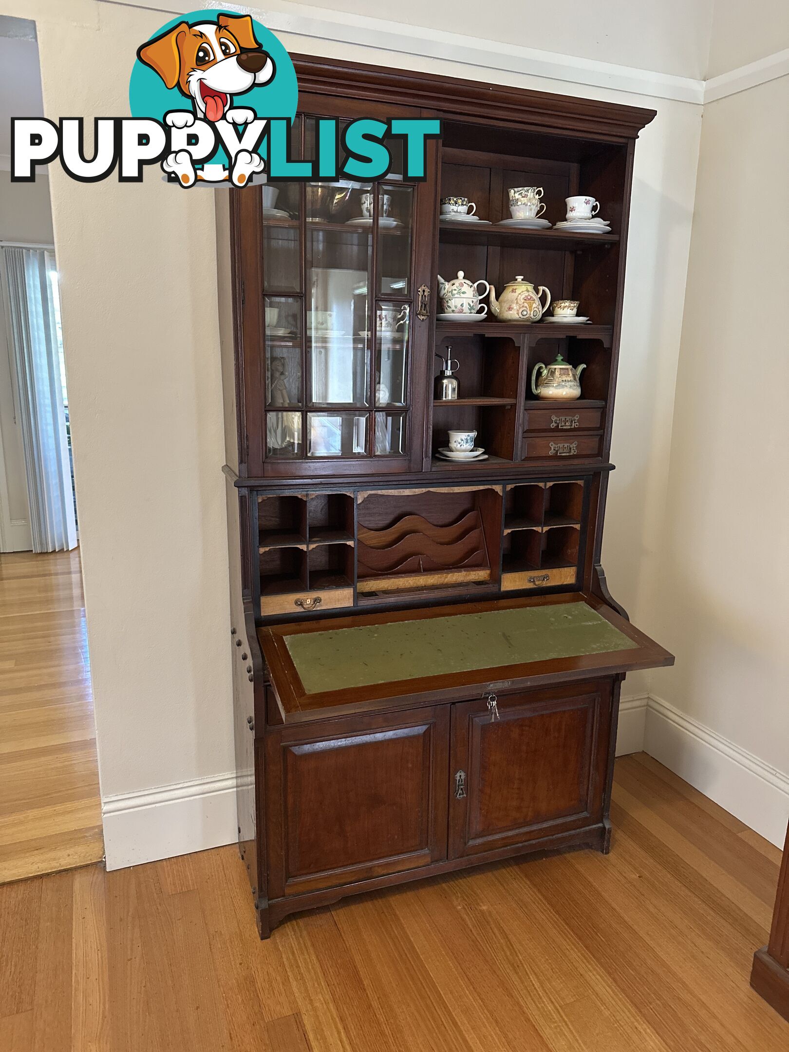 Antique bookcase with foldout desk and sideboard