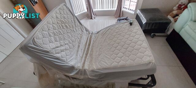 Electric bed with mattress