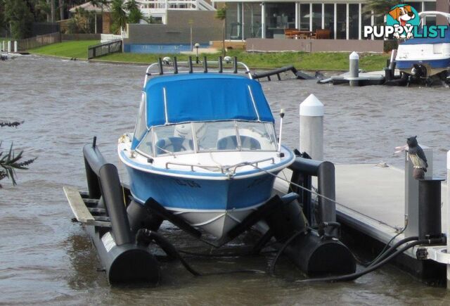 Streaker 5.02 Runabout/Evinrude ETEC Motor/Brooker Tandem Tilt Trailer