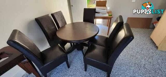Elegant Dark Wood Dining Table with 6 Leather Chairs Good Condition