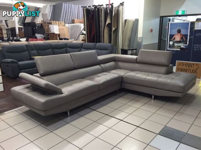 CLEARANCE CORNER LOUNGE W/ADJUSTABLE HEADRESTS AND ARMREST