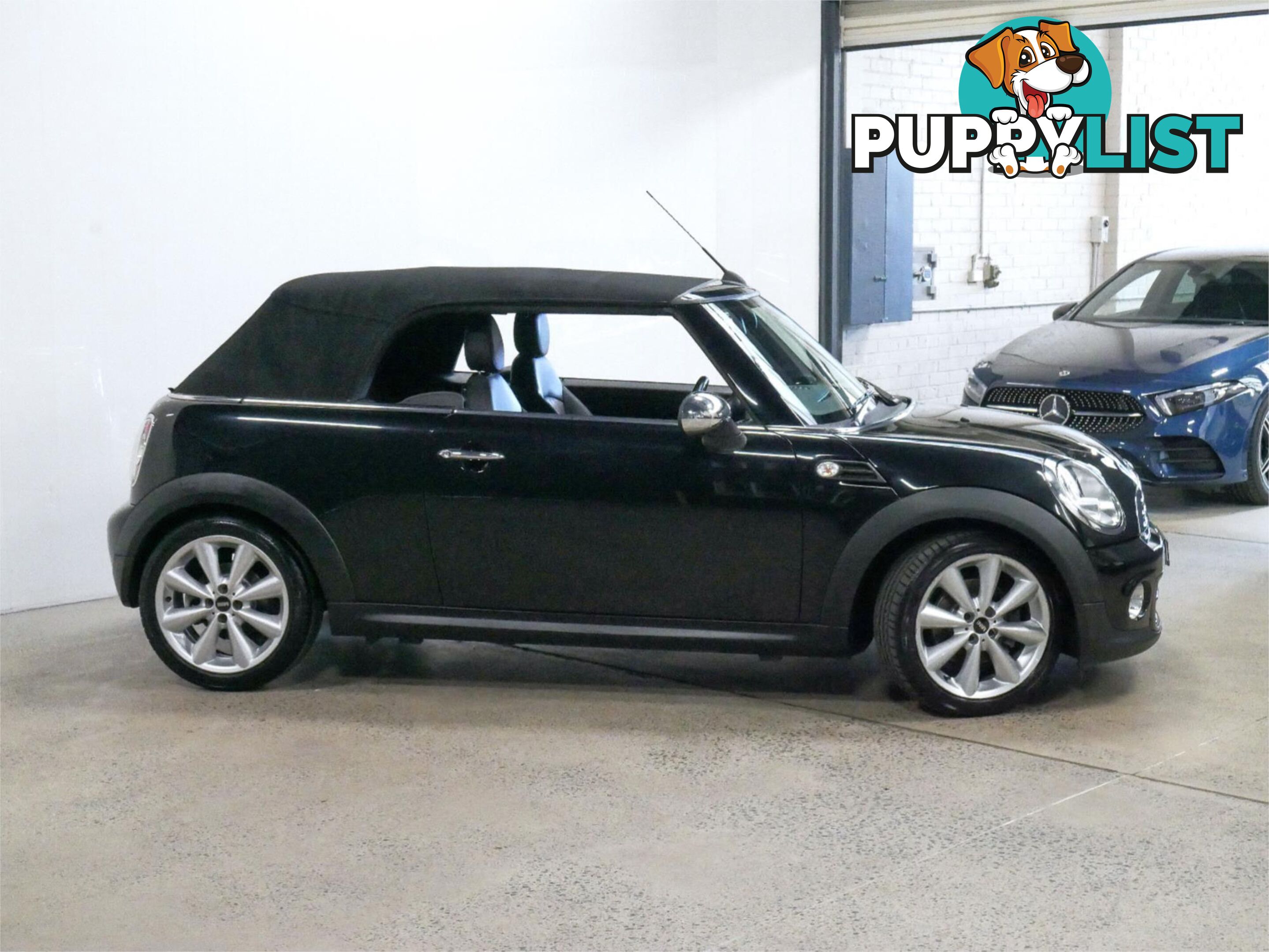2011 MINI COOPER CABRIO R57MY11 2D CONVERTIBLE