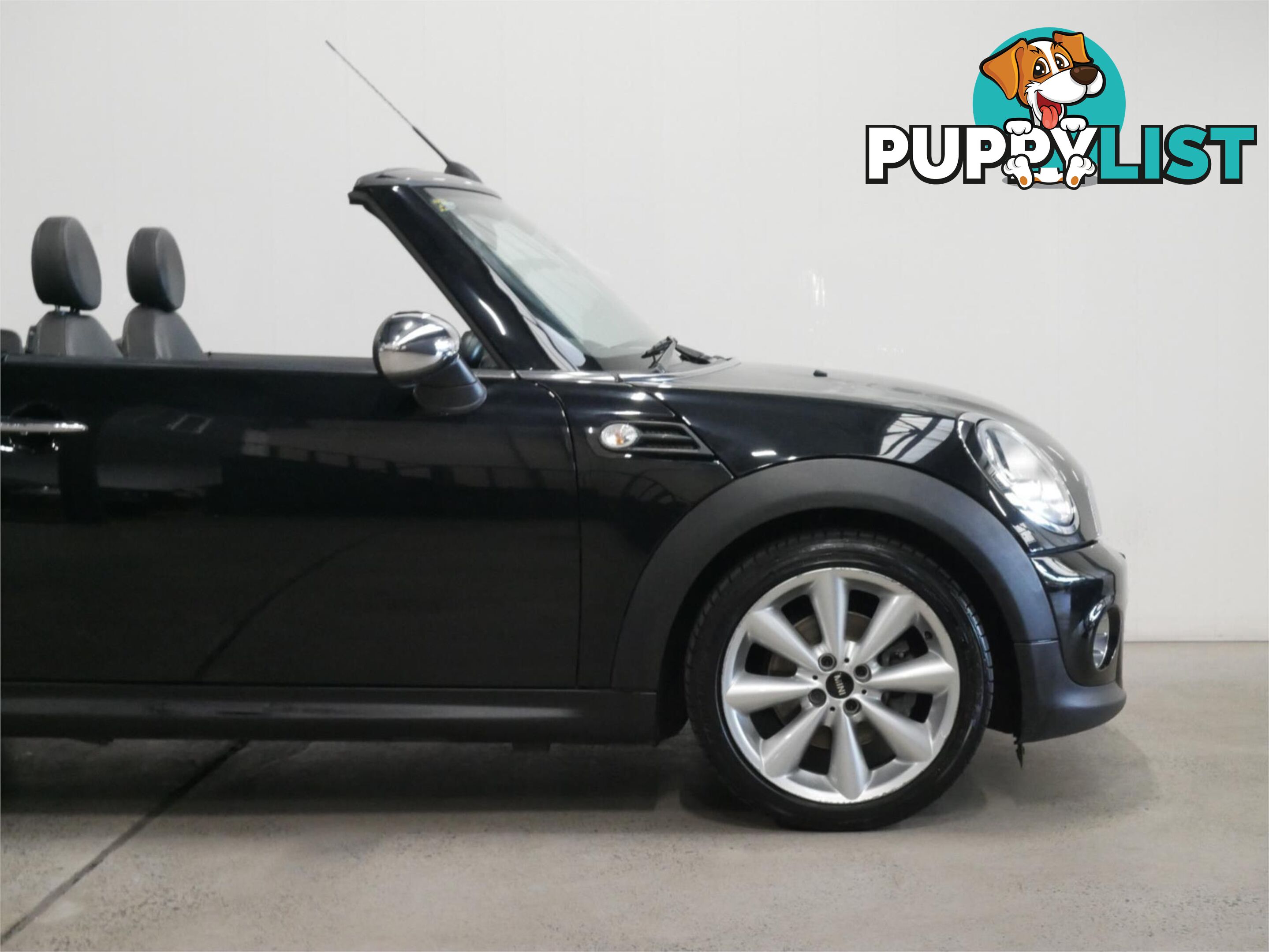 2011 MINI COOPER CABRIO R57MY11 2D CONVERTIBLE
