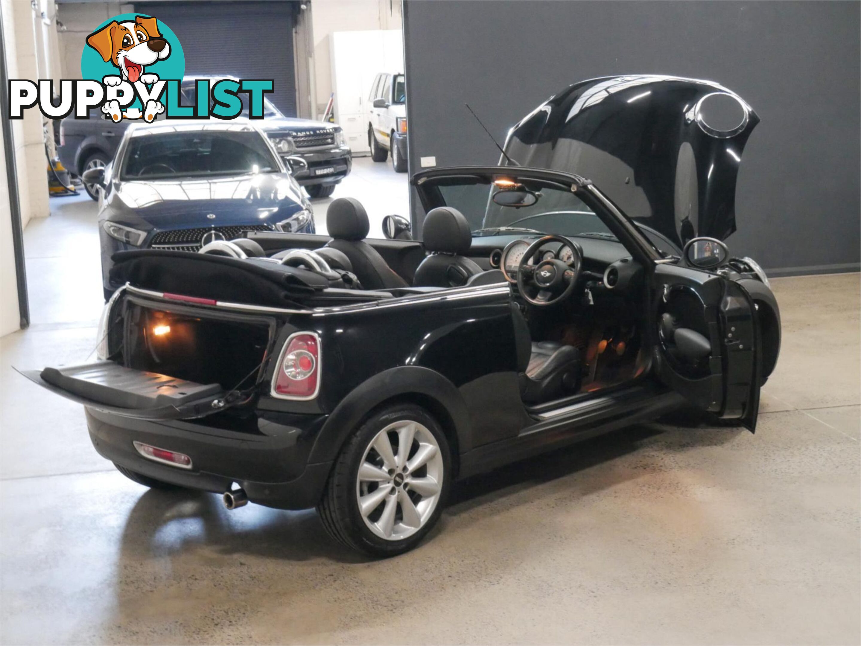 2011 MINI COOPER CABRIO R57MY11 2D CONVERTIBLE