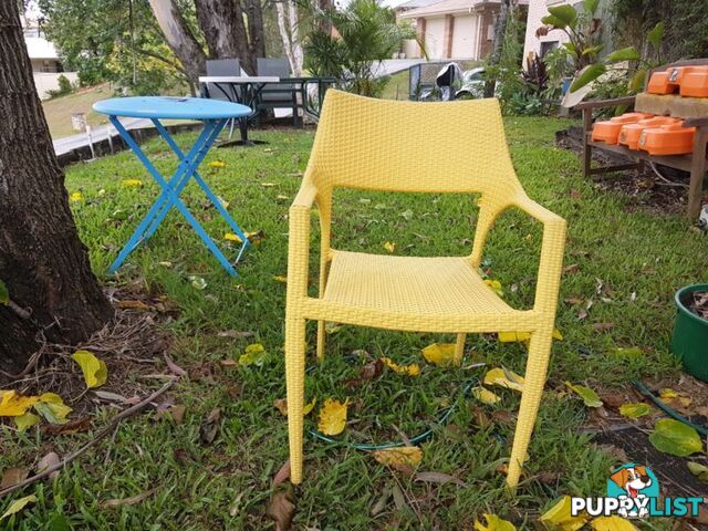 single yellow wicker chair