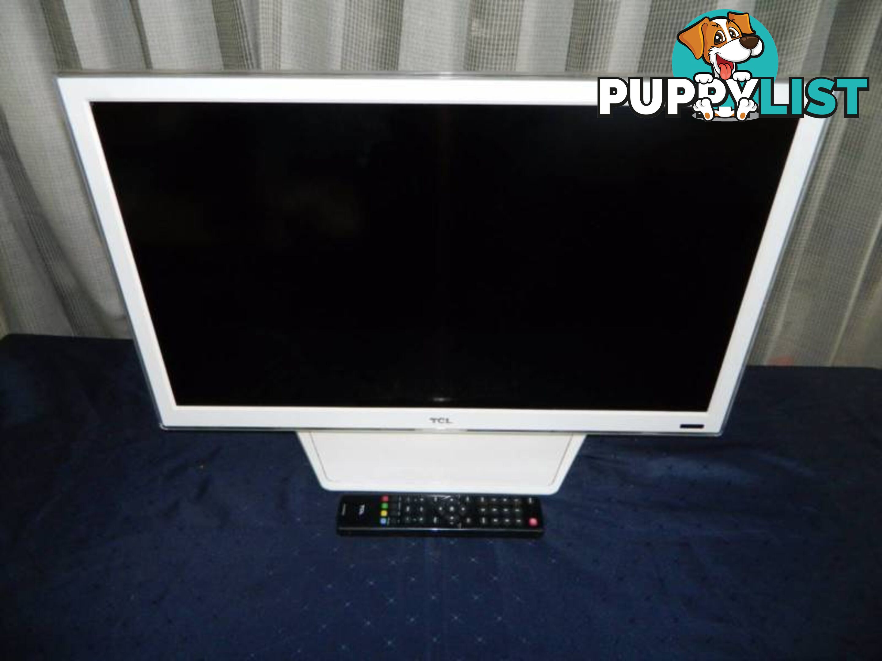 TCL 26" LED TV with Remote - Model: L26E4100W