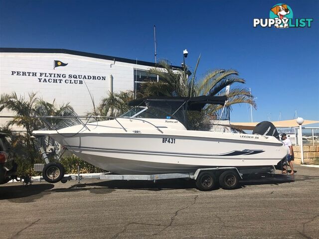 Leeder Tomcat 240 with Outboard and Trailer