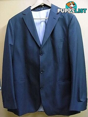 HUGO BOSS SUIT MADE IN USA. JACKET SIZE 44L pants 34 inch EXCEL