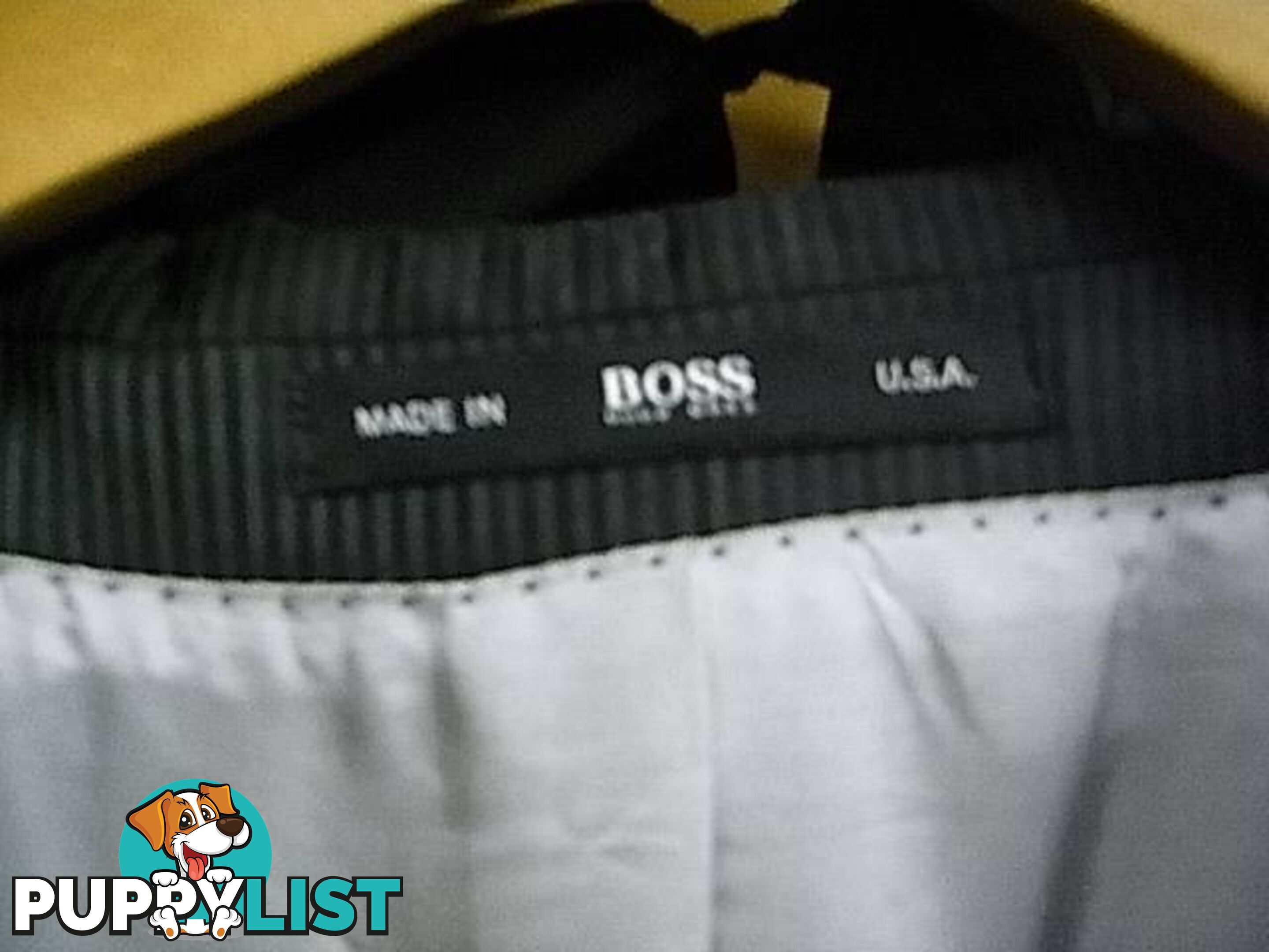 HUGO BOSS SUIT MADE IN USA. JACKET SIZE 44L pants 34 inch EXCEL