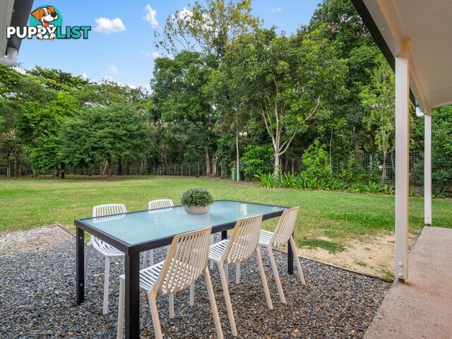9 Baronia Crescent HOLLOWAYS BEACH QLD 4878