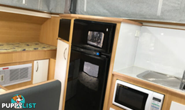 CARAVAN REPAIRS AND CONVERSIONS, AIR CONDITIONER AND MICROWAVE OVEN INSTALLATION