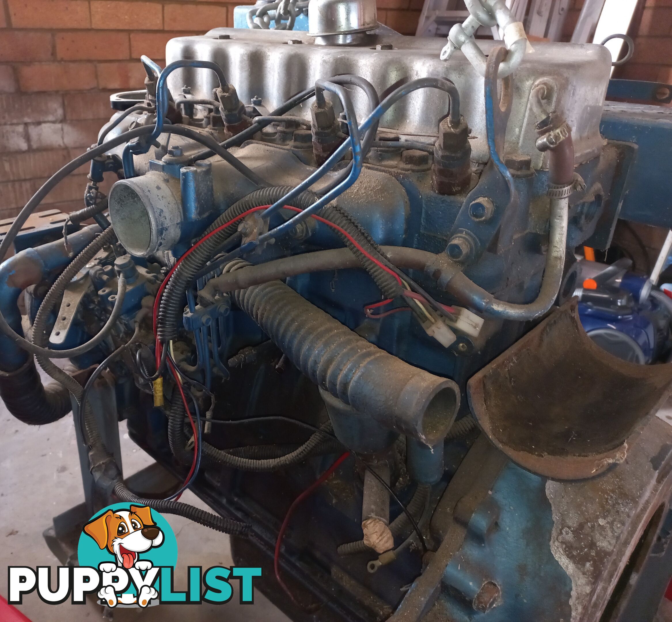 Nissan ED33 diesel engine with Marine conversion kit - about 80 hp.