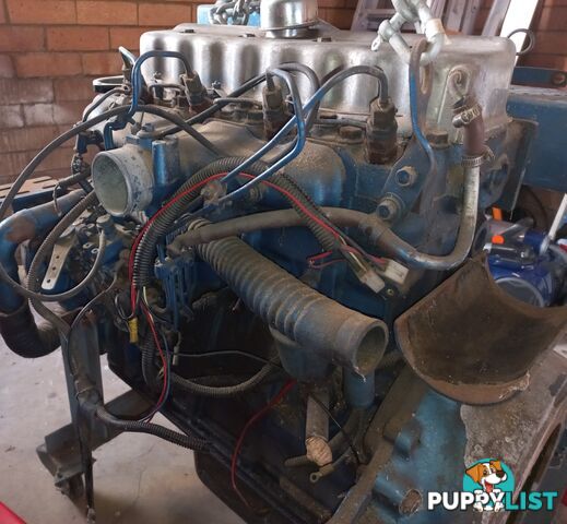 Nissan ED33 diesel engine with Marine conversion kit - about 80 hp.