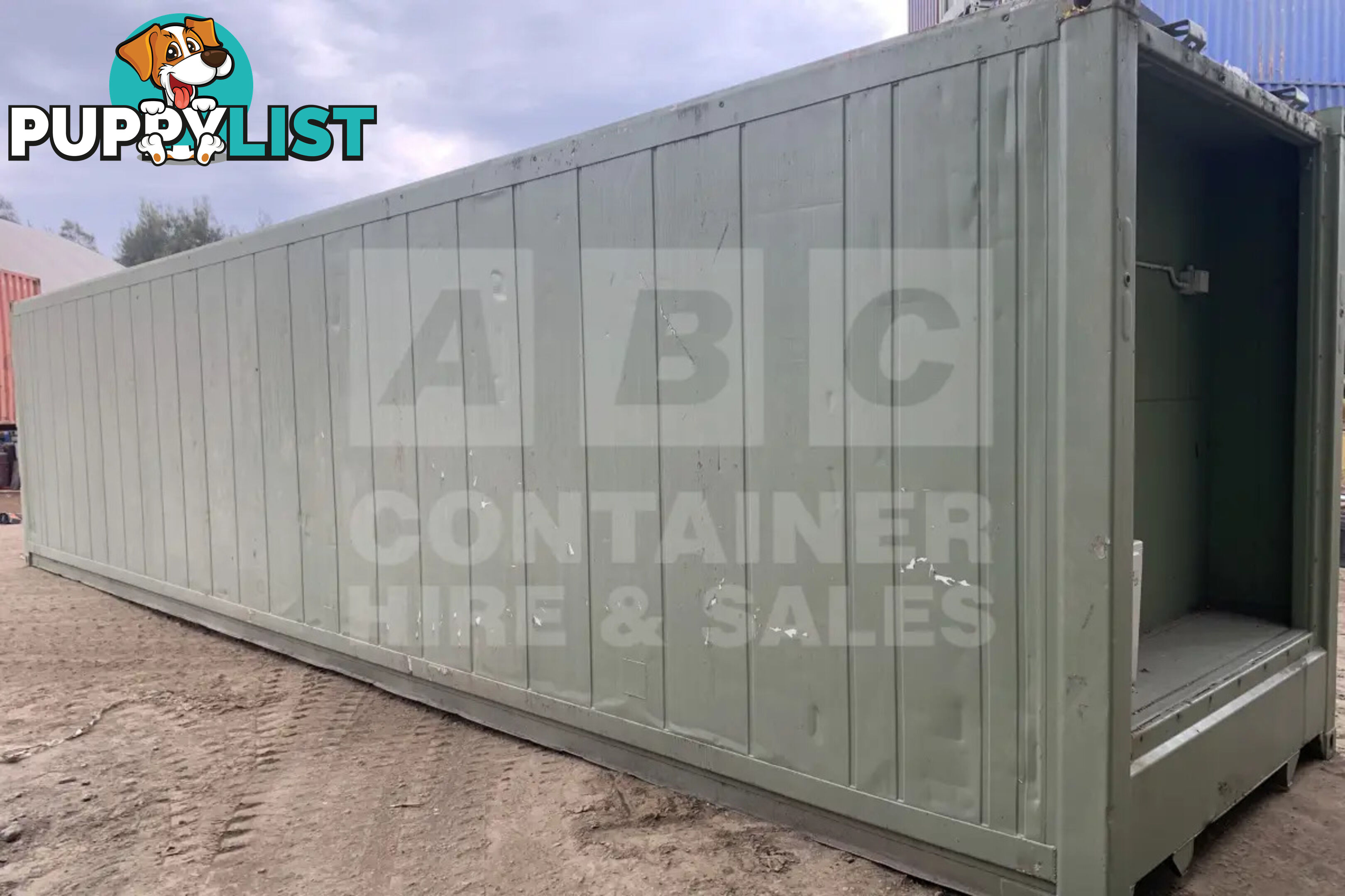 40' HIGH CUBE SHIPPING CONTAINER (NON-OPERATIONAL, MODIFIED)