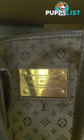 Lois Vuitton hand band...$30ono