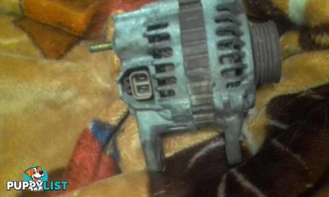 96-03 ce Mitsubishi lancer alternator $60ono