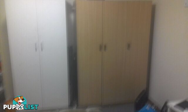 Light brown chipboard wardrobe $70 ono negotiable excellent cond