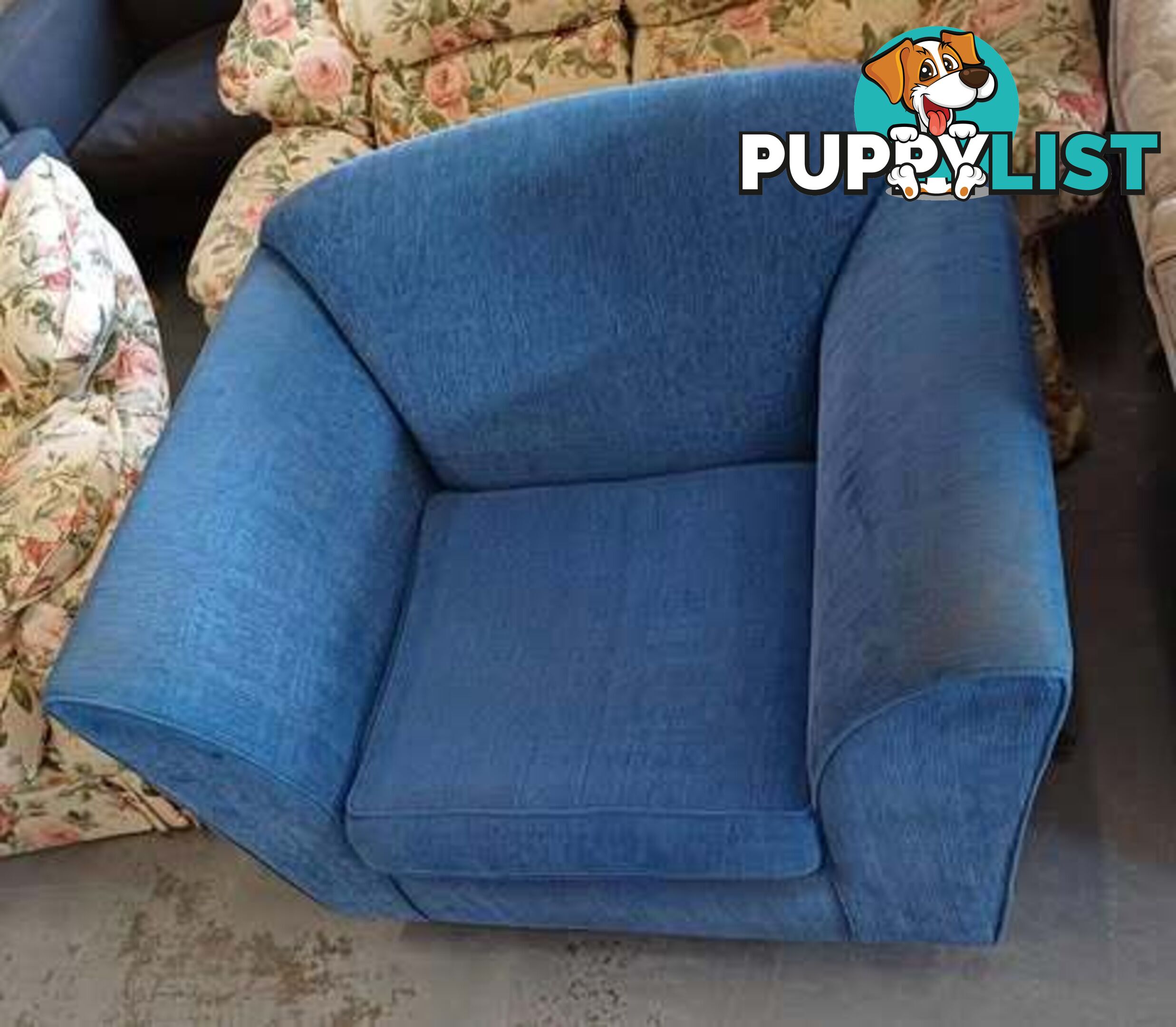 Extra Large very comfortable blue single lounge chair.