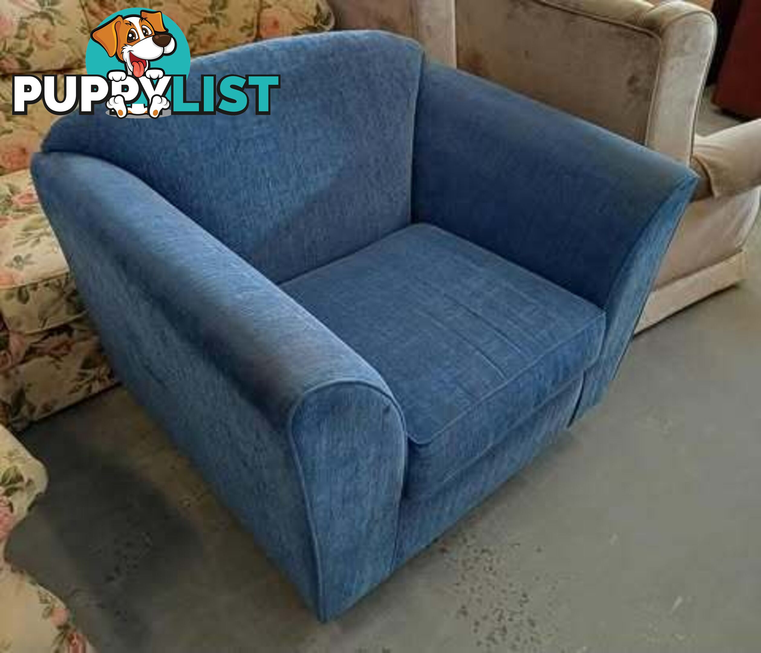 Extra Large very comfortable blue single lounge chair.