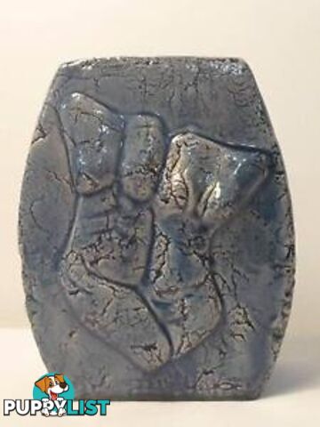 Blue vase with male & female torso