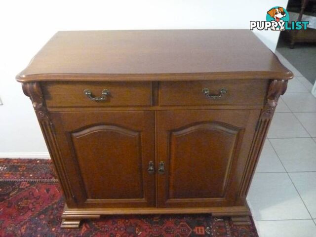 2 Door 2 Drawer Cabinet with fluted columns and carved decoration