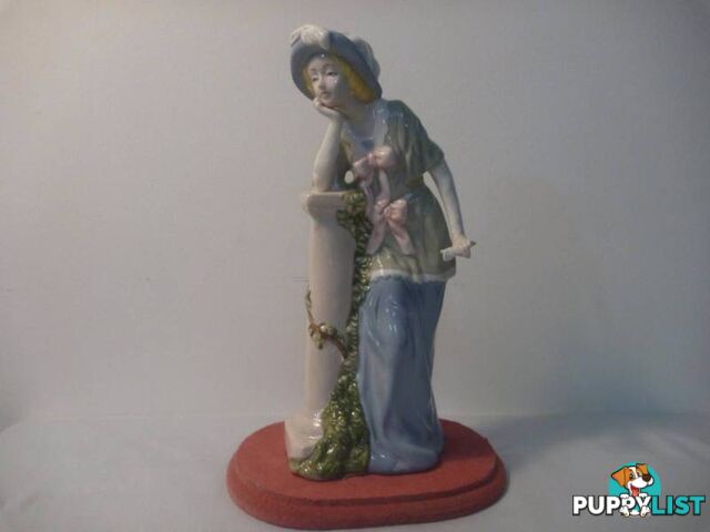 Girl standing beside pillar Figurine (2 Available)